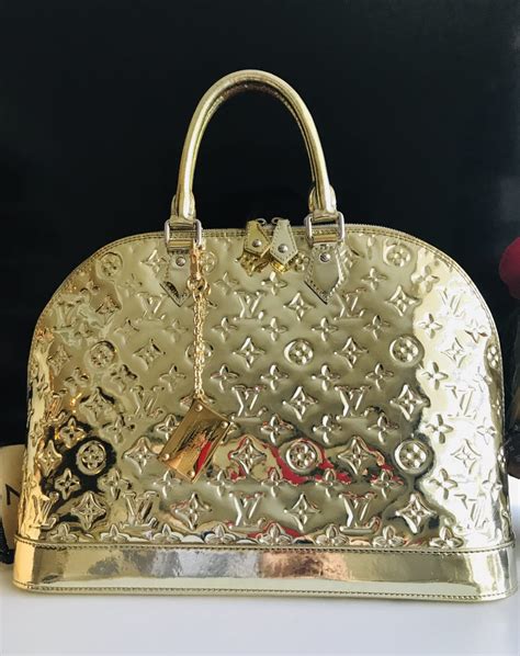 louis vuitton gold plate on purse|Louis Vuitton quilted purse.